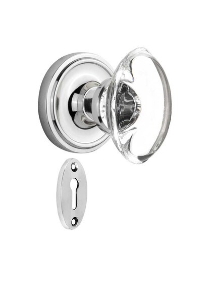 Classic Rosette Mortise-Lock Set with Oval Crystal Glass Knobs in Polished Chrome.